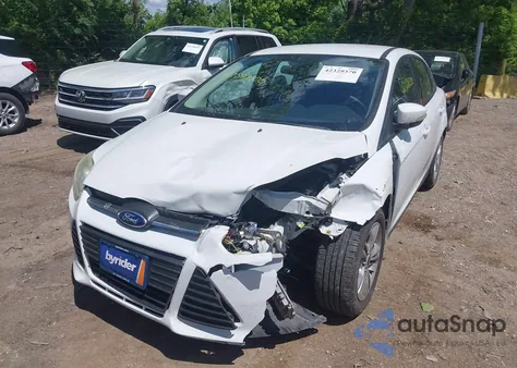 2014 Ford Focus Se z USA, uszkodzony, nr VIN 1FADP3F27EL128559